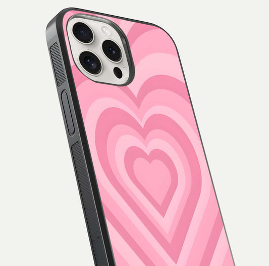 Blush Heart Waves iPhone 15 Pro Max glass phone case angled back view highlighting romantic heart wave artwork and grip texture