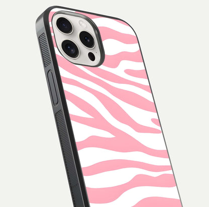 Blush Zebra Flow iPhone 15 Pro Max glass phone case angled back view highlighting bold zebra artwork and textured side grip