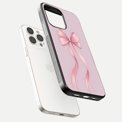 Soft Blush Bow iPhone 15 Pro Max glass phone case floating view emphasizing glossy surface and soft feminine styling