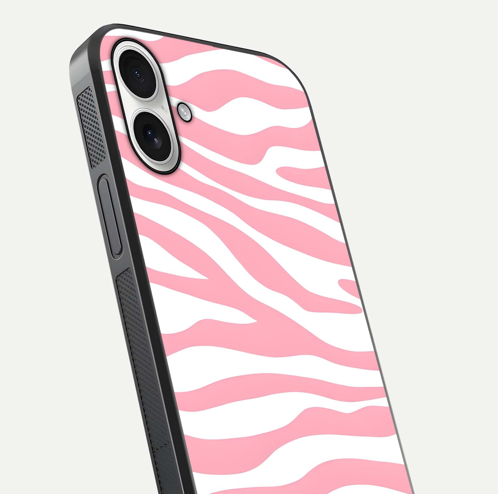 Blush Zebra Flow iPhone 17 glass phone case angled back view highlighting bold zebra artwork and textured side grip
