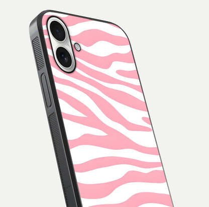 Blush Zebra Flow iPhone 17 glass phone case angled back view highlighting bold zebra artwork and textured side grip