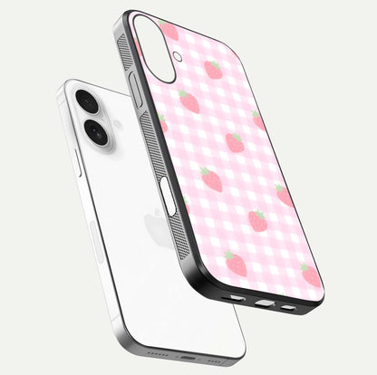 Strawberry Picnic Love iPhone 17 glass phone case floating view emphasizing glossy finish and playful charm