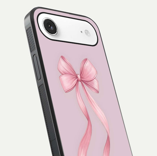 Soft Blush Bow iPhone Air glass phone case angled back view highlighting bow artwork and side grip texture