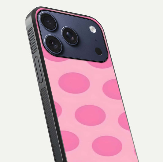 Sweet Dot Dreams iPhone 17 Pro glass phone case angled back view highlighting dotted artwork and side grip texture