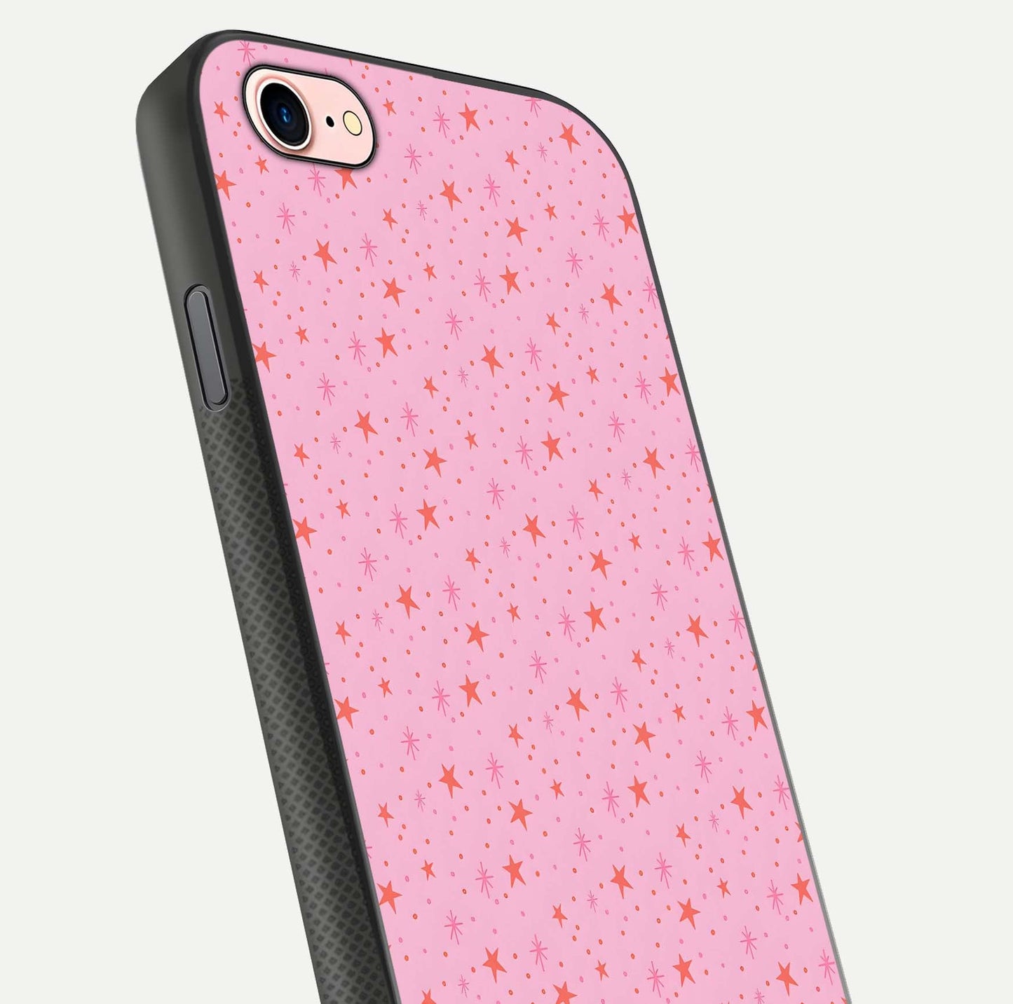 Cosmic Pink Sparkle iPhone 7 glass phone case angled back view highlighting sparkling galaxy design and textured side grip