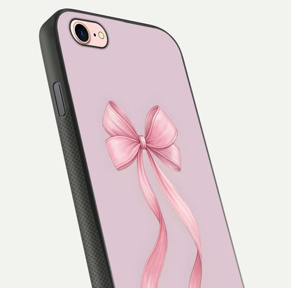 Soft Blush Bow iPhone 7 glass phone case angled back view highlighting bow artwork and side grip texture
