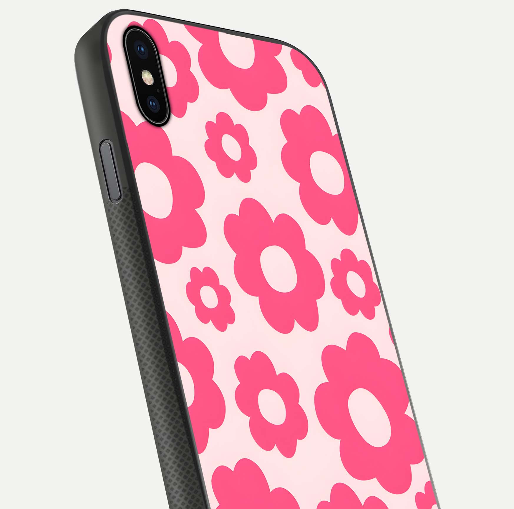 Blush Flower Pop iPhone Xs Max glass phone case angled back view highlighting bright floral pop design and side grip texture