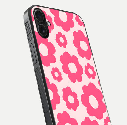 Blush Flower Pop iPhone 16 Plus glass phone case angled back view highlighting bright floral pop design and side grip texture