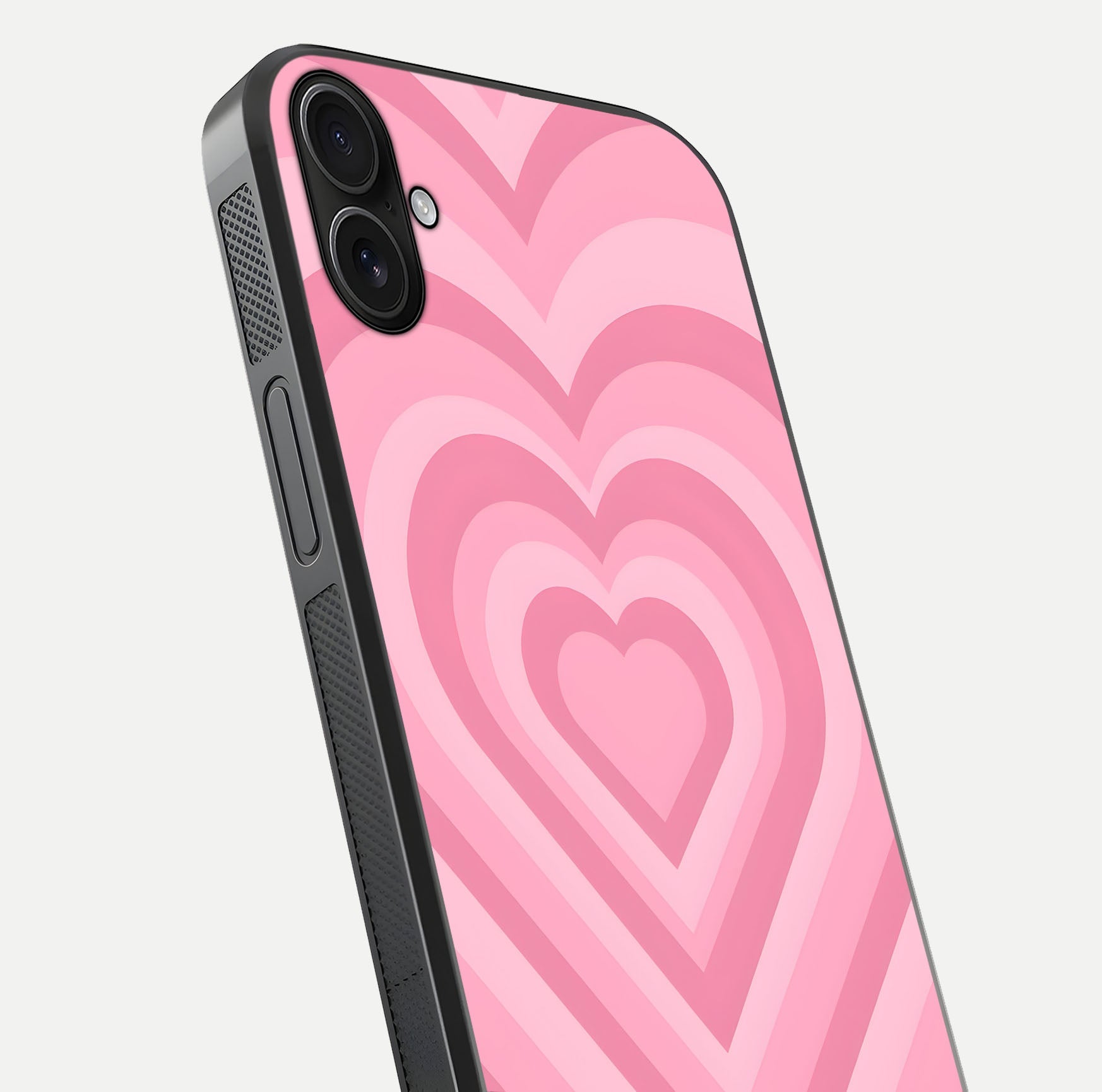Blush Heart Waves iPhone 16 Plus glass phone case angled back view highlighting romantic heart wave artwork and grip texture