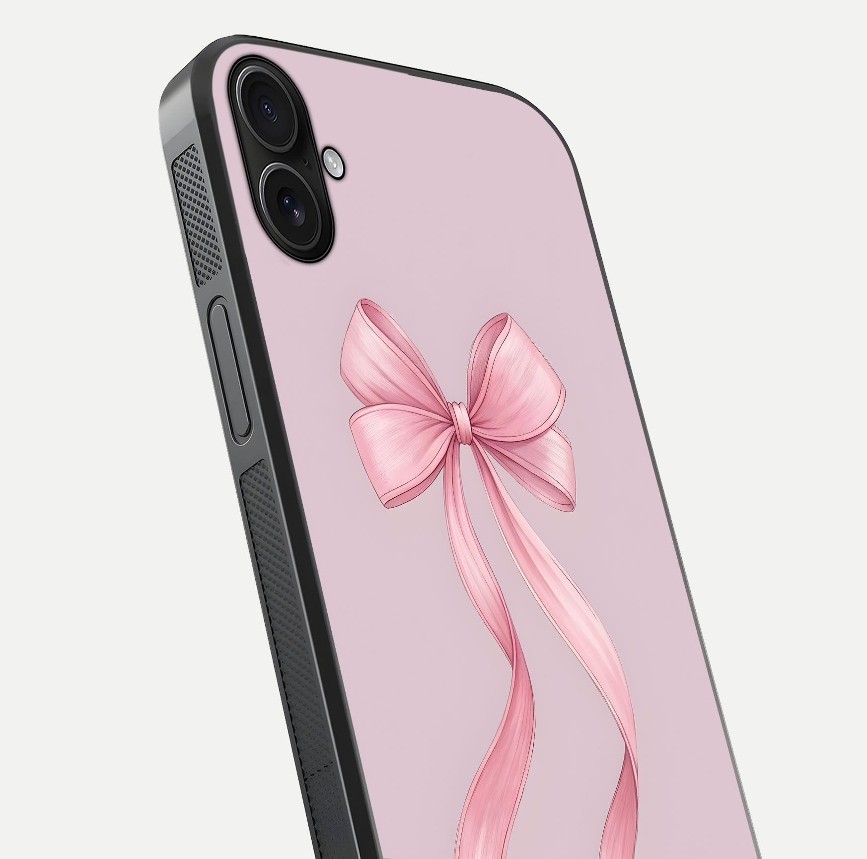 Soft Blush Bow iPhone 16 Plus glass phone case angled back view highlighting bow artwork and side grip texture