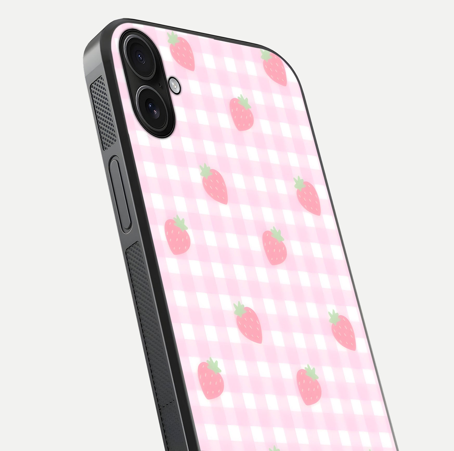 Strawberry Picnic Love iPhone 16 Plus glass phone case angled back view highlighting strawberry illustrations and textured grip