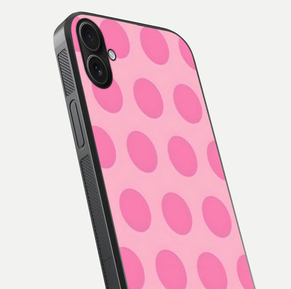Sweet Dot Dreams iPhone 16 Plus glass phone case angled back view highlighting dotted artwork and side grip texture