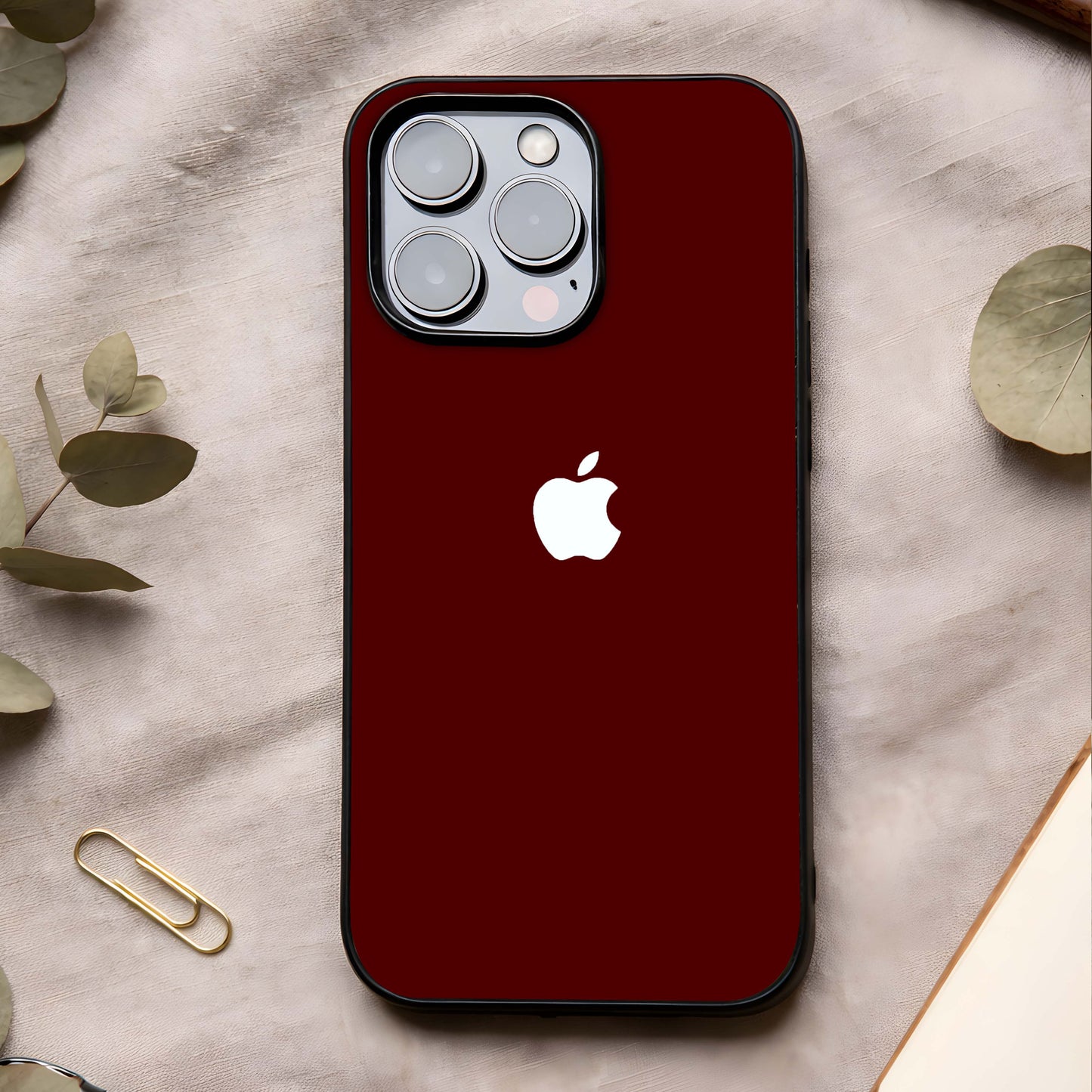 Apple Crimson Core Glass Case showing full back design in clean flat view with rich crimson tones and glossy glass finish.