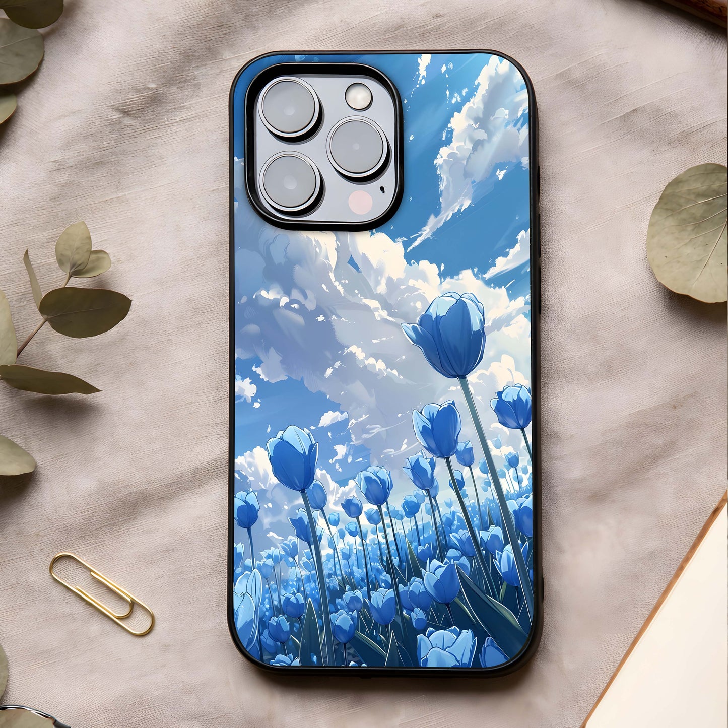 Blue Tulip Clouds Glass Case showing full back design in clean flat view with floral sky tones and glossy glass finish.