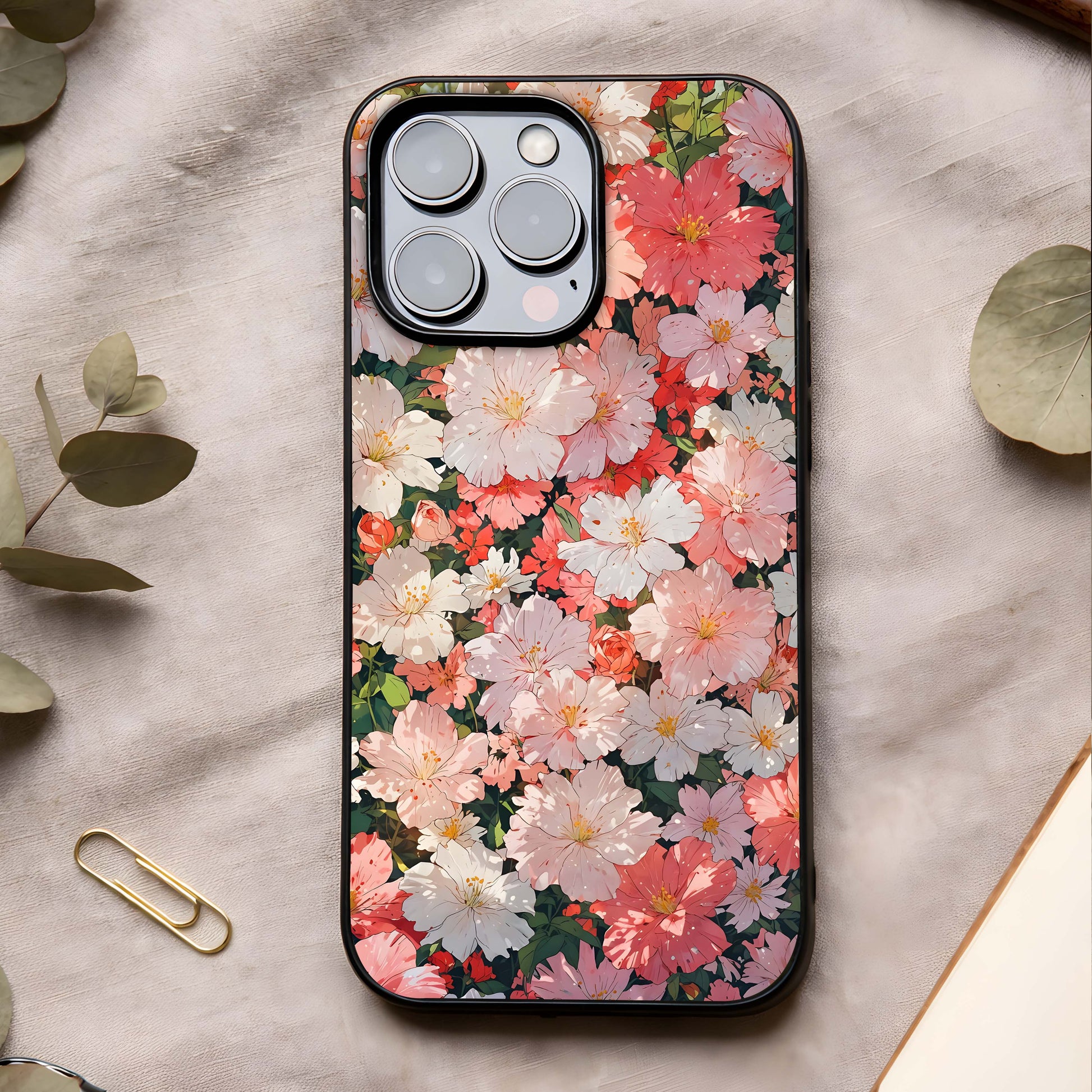 Blush Bloom Field Glass Case showing full back design in clean flat view with pastel florals and glossy glass finish.