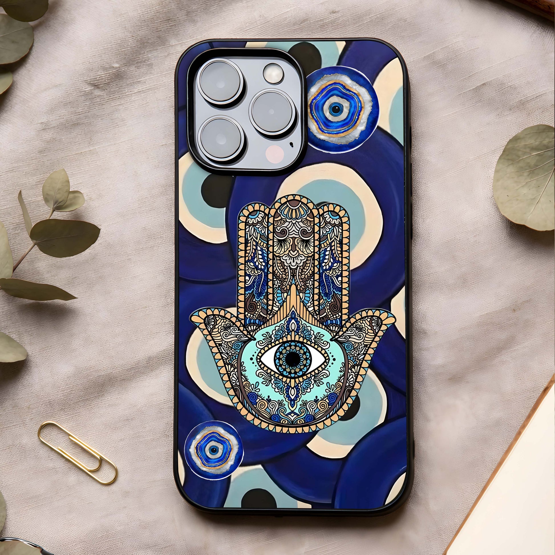 Hamsa Divine Guard Glass Case showing full back design in clean flat view with protective hamsa symbol and glossy glass finish.