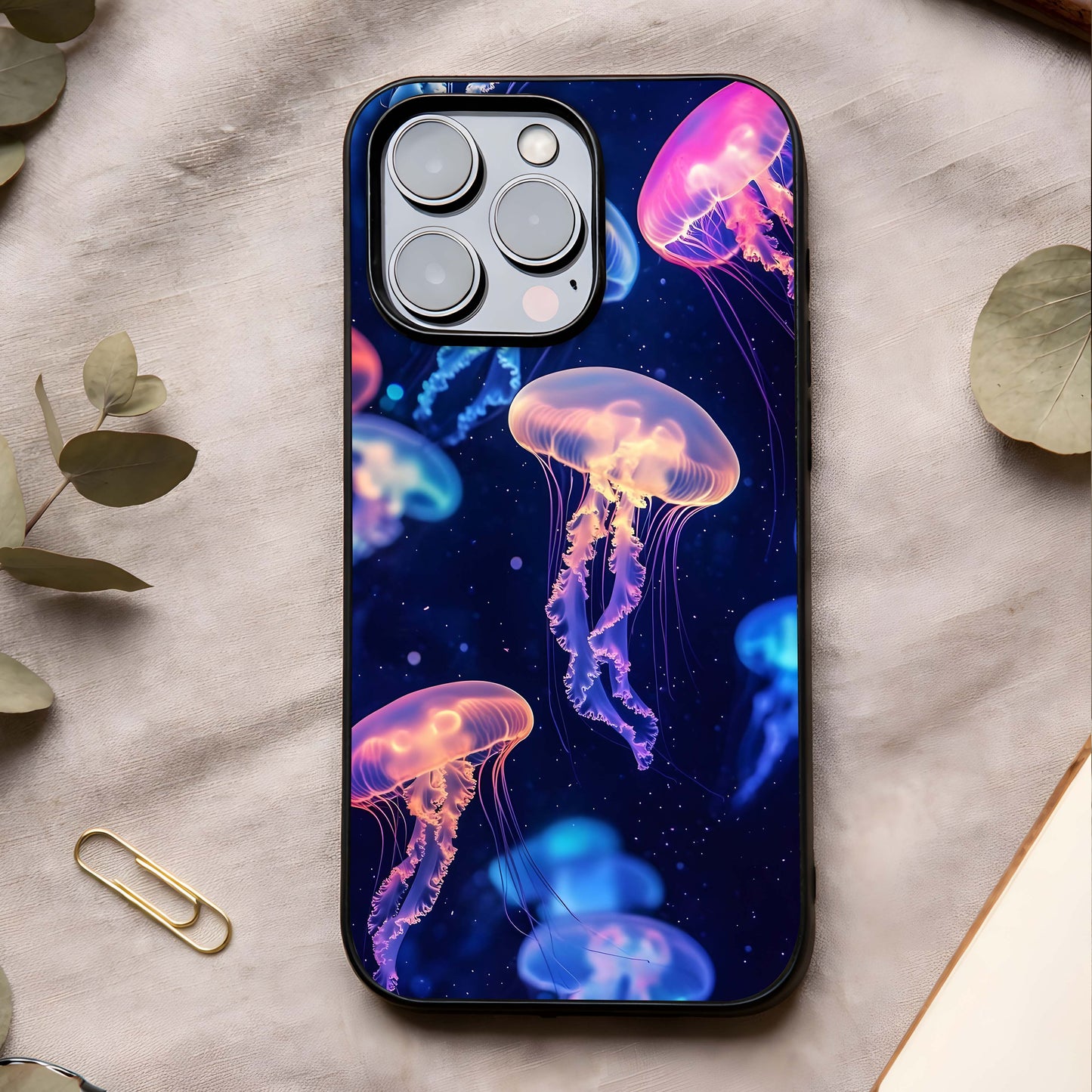 Jellyfish Pattern Glass Case showing full back design in clean flat view with floating jellyfish motifs and glossy glass finish.