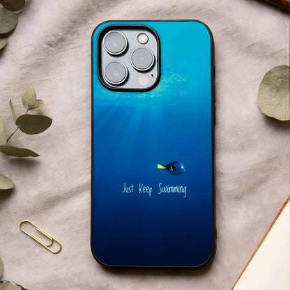 Just Keep Swimming Glass Case showing full back design in clean flat view with motivational aquatic art and glossy glass finish.