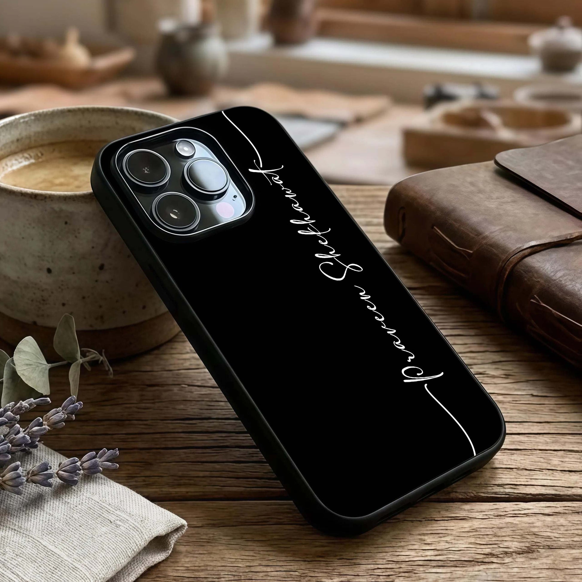 Black Tune Custom Name Glass Case captured at a warm angle highlighting sleek texture, gloss, and edge clarity.