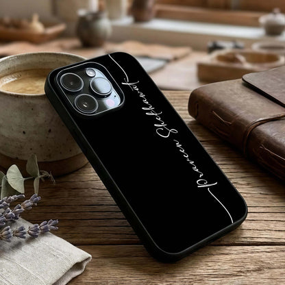 Black Tune Custom Name Glass Case captured at a warm angle highlighting sleek texture, gloss, and edge clarity.