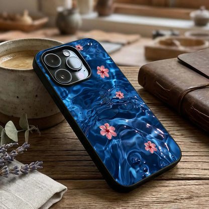 Blooming Water Drift Glass Case captured at a warm angle highlighting flowing textures, gloss, and edge clarity.