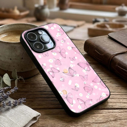 Blush Butterfly Garden Glass Case captured at a warm angle highlighting graceful details, gloss, and edge clarity.