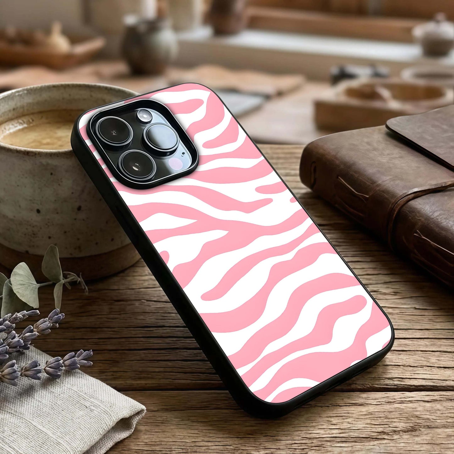 Blush Zebra Flow Glass Case captured at a warm angle highlighting flowing stripes, gloss, and edge clarity.