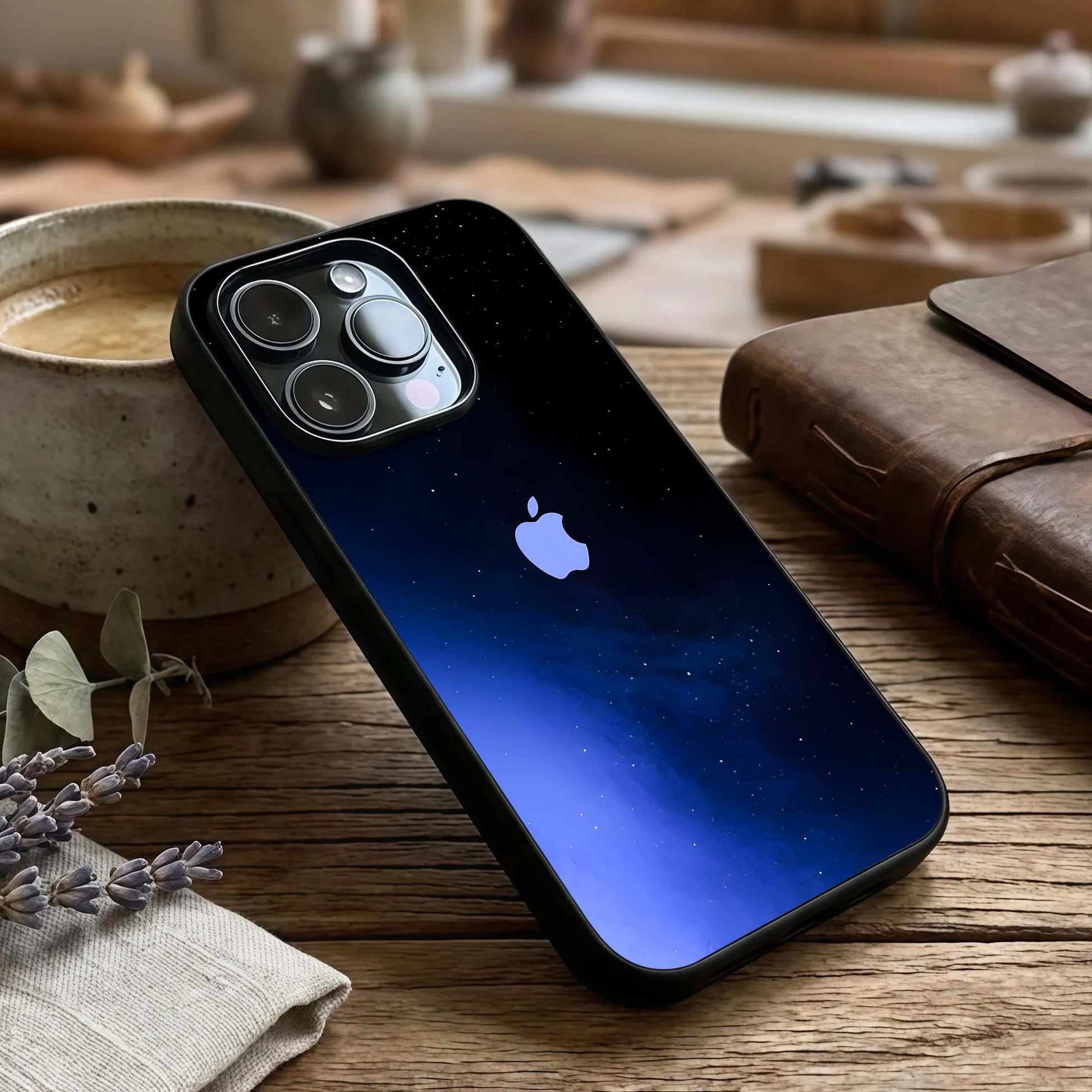 Cosmic Blue Apple Glass Case captured at a warm angle highlighting galaxy tones, gloss, and edge clarity.