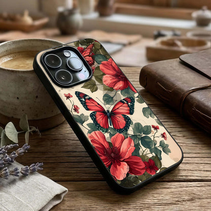 Crimson Butterfly Garden Glass Case captured at a warm angle highlighting layered petals, gloss, and edge clarity.