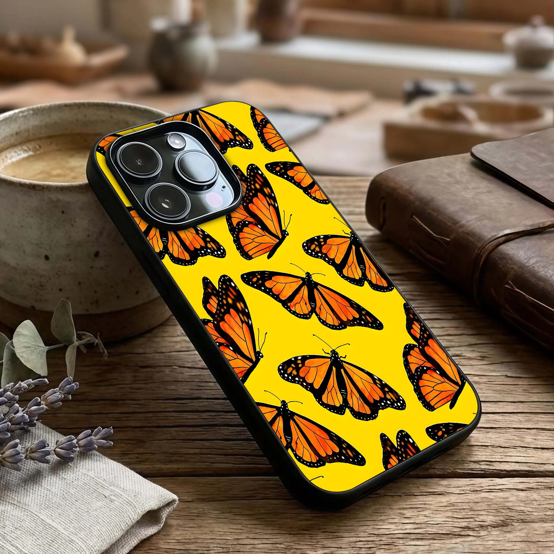 Golden Wing Flight Glass Case captured at a warm angle highlighting feather details, gloss, and edge clarity.