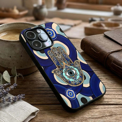 Hamsa Divine Guard Glass Case captured at a warm angle highlighting sacred detailing, gloss, and edge clarity.