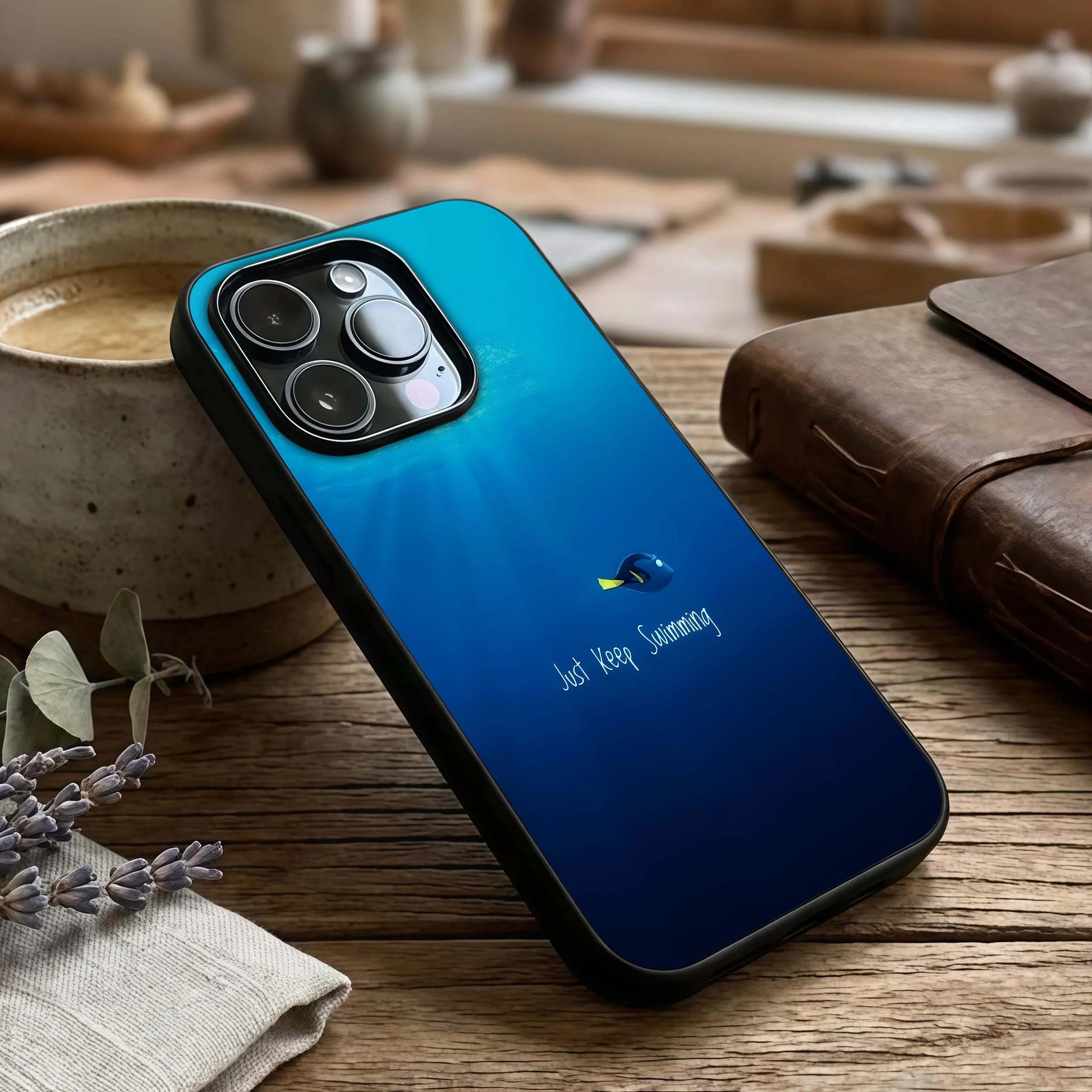 Just Keep Swimming Glass Case captured at a warm angle highlighting fluid motion, gloss, and edge clarity.