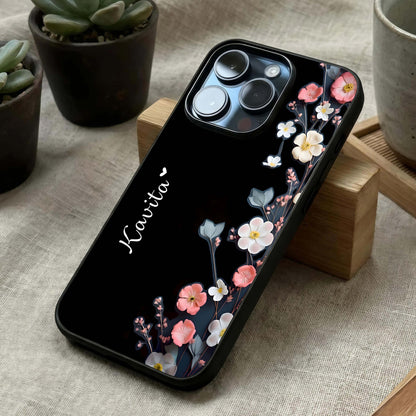 Black Elegance Floral Custom Name Glass Case laid diagonally highlighting floral contrast and HD glass shine.