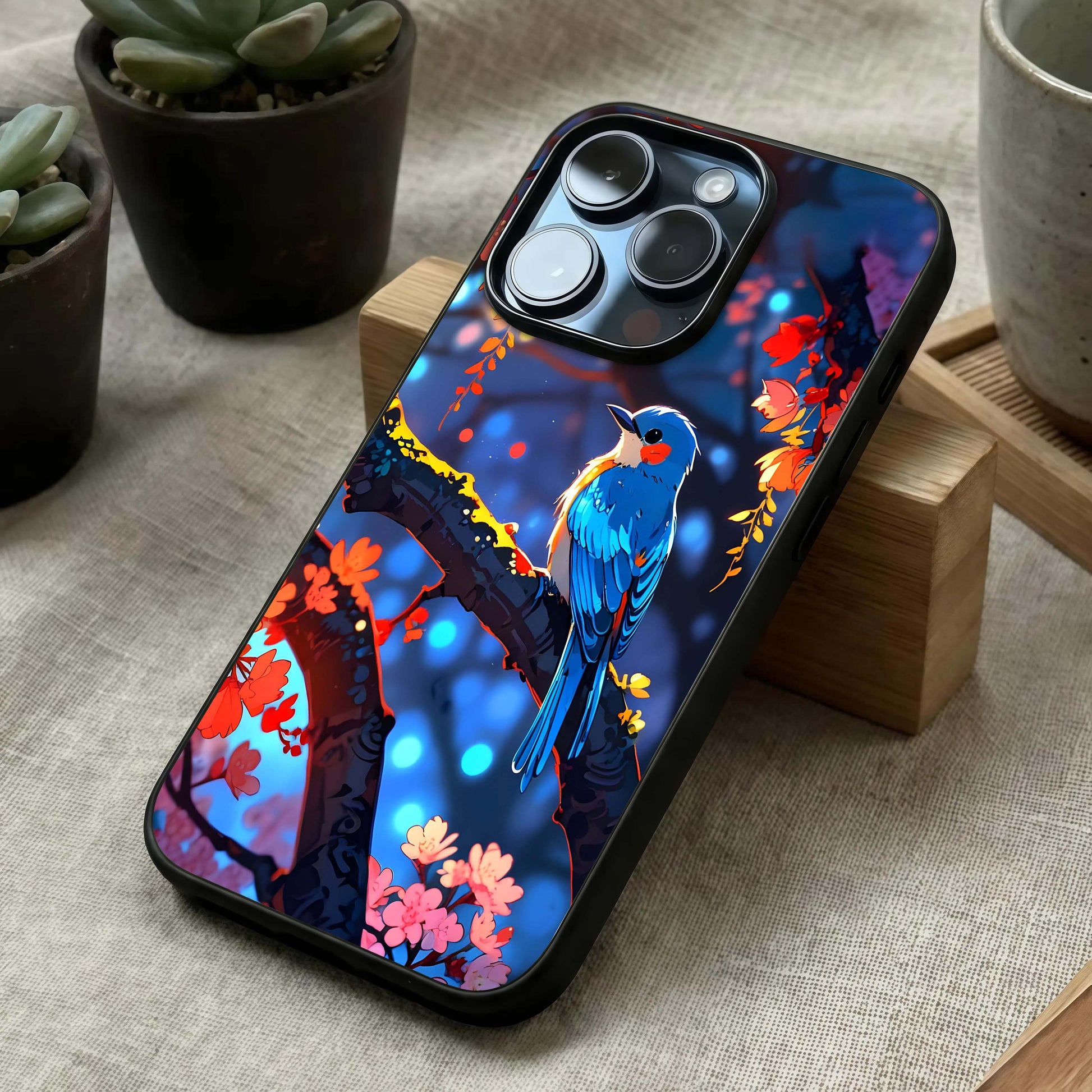 Blooming Spendor Bird Glass Case laid diagonally highlighting natural flow and HD glass shine.