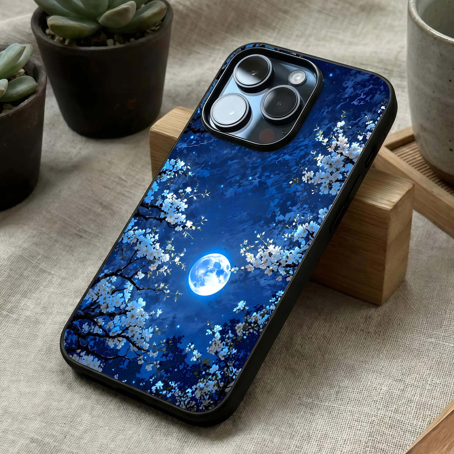Blossom Moonlight Sky Glass Case laid diagonally highlighting soft glow elements and HD glass shine.