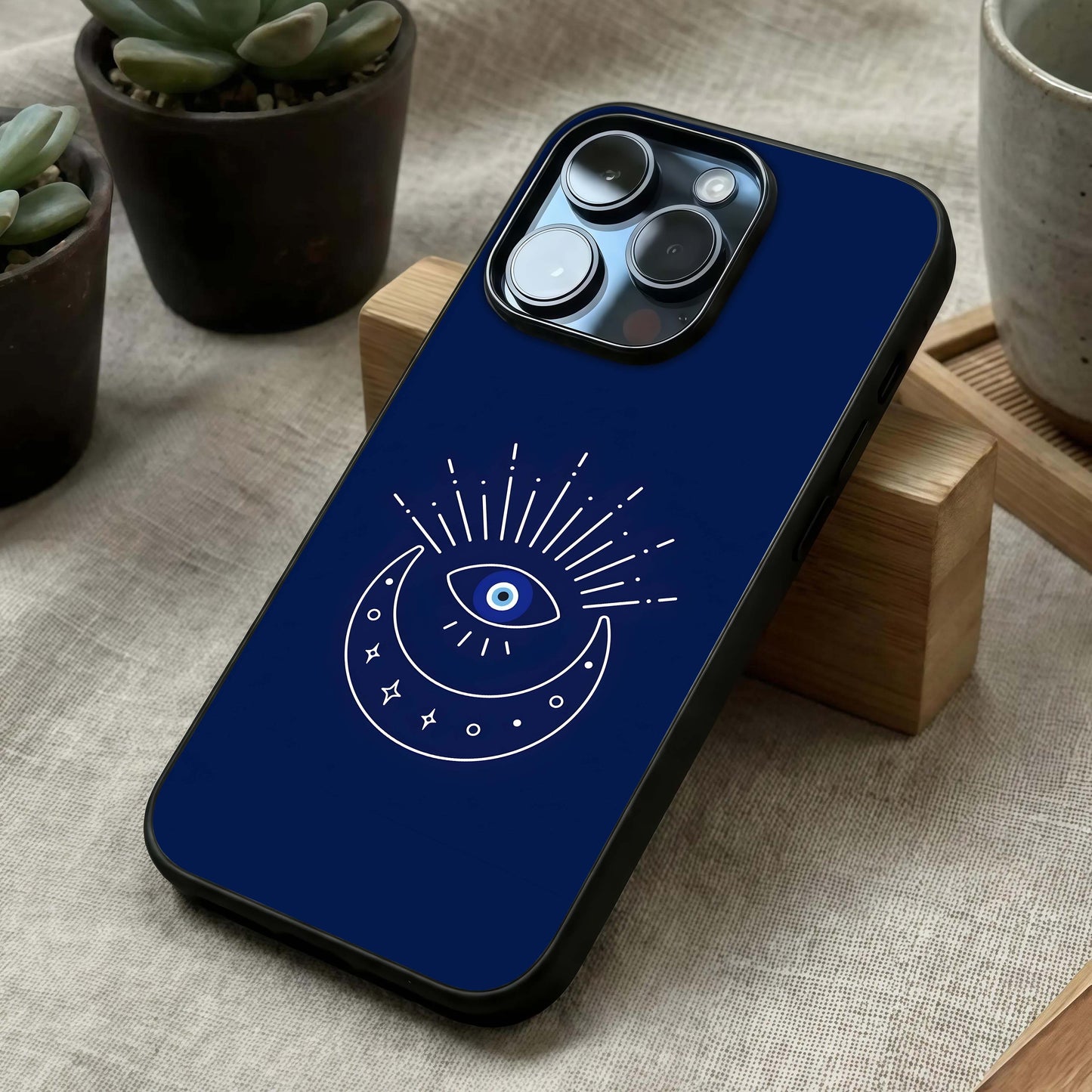 Blue Evil Eye Glass Case laid diagonally highlighting striking contrast and HD glass shine.
