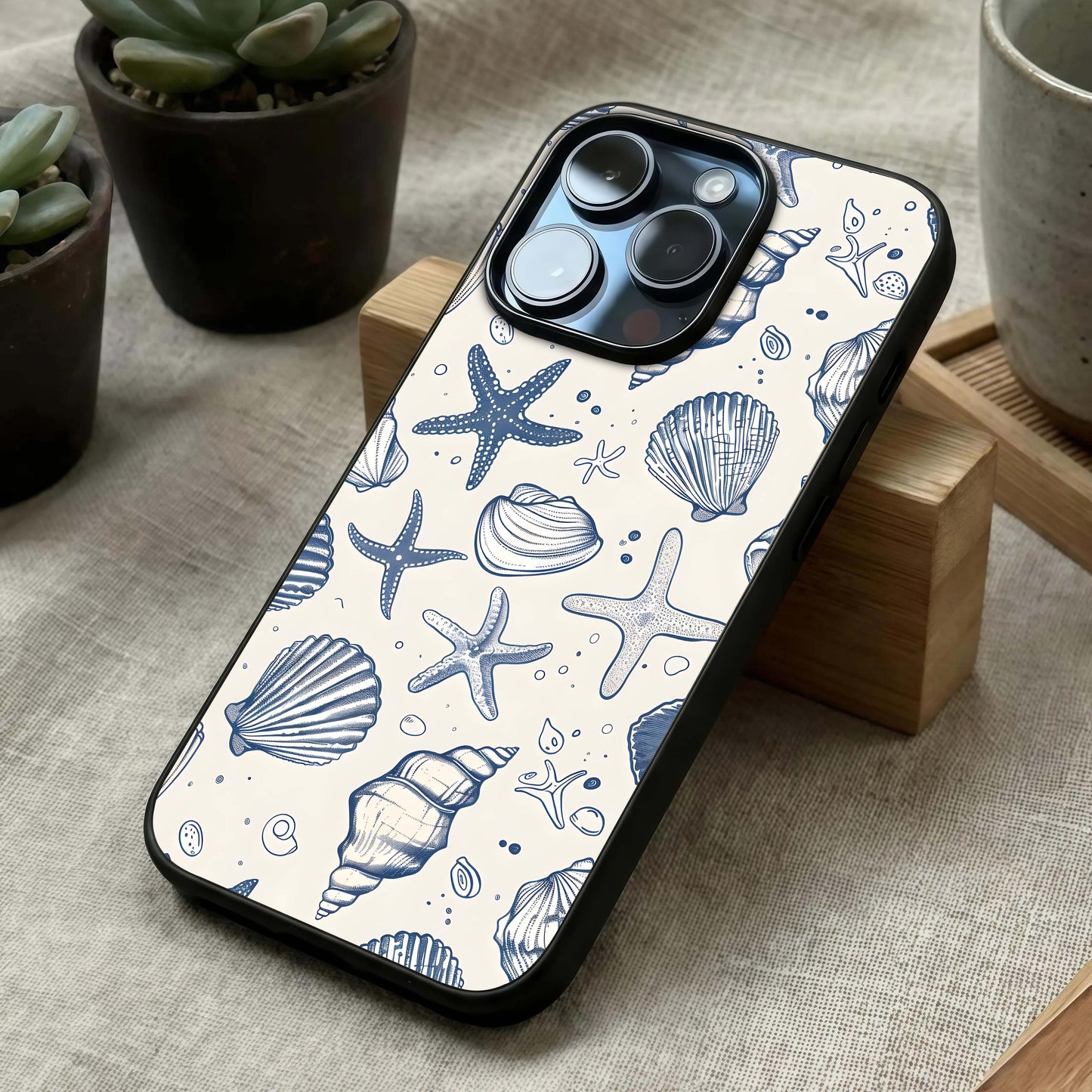 Blue Ocean Outline Glass Case laid diagonally highlighting smooth contours and HD glass shine.