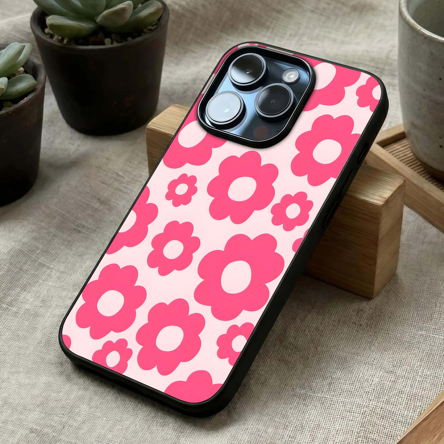 Blush Flower Pop Glass Case laid diagonally highlighting playful contrast and HD glass shine.