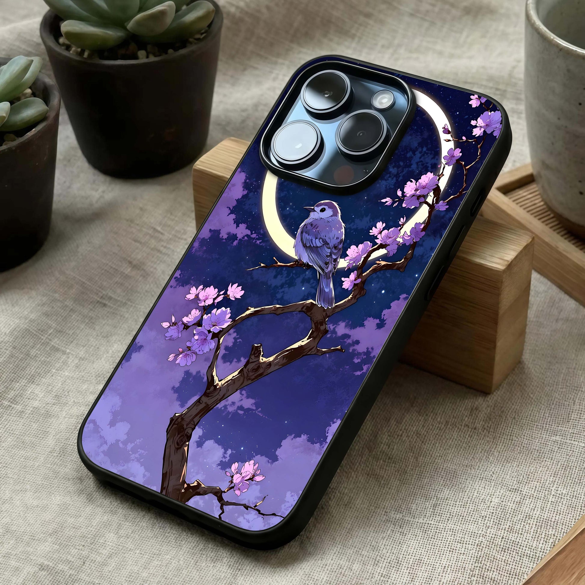 Celestial Bird Blossom Glass Case laid diagonally highlighting radiant elements and HD glass shine.