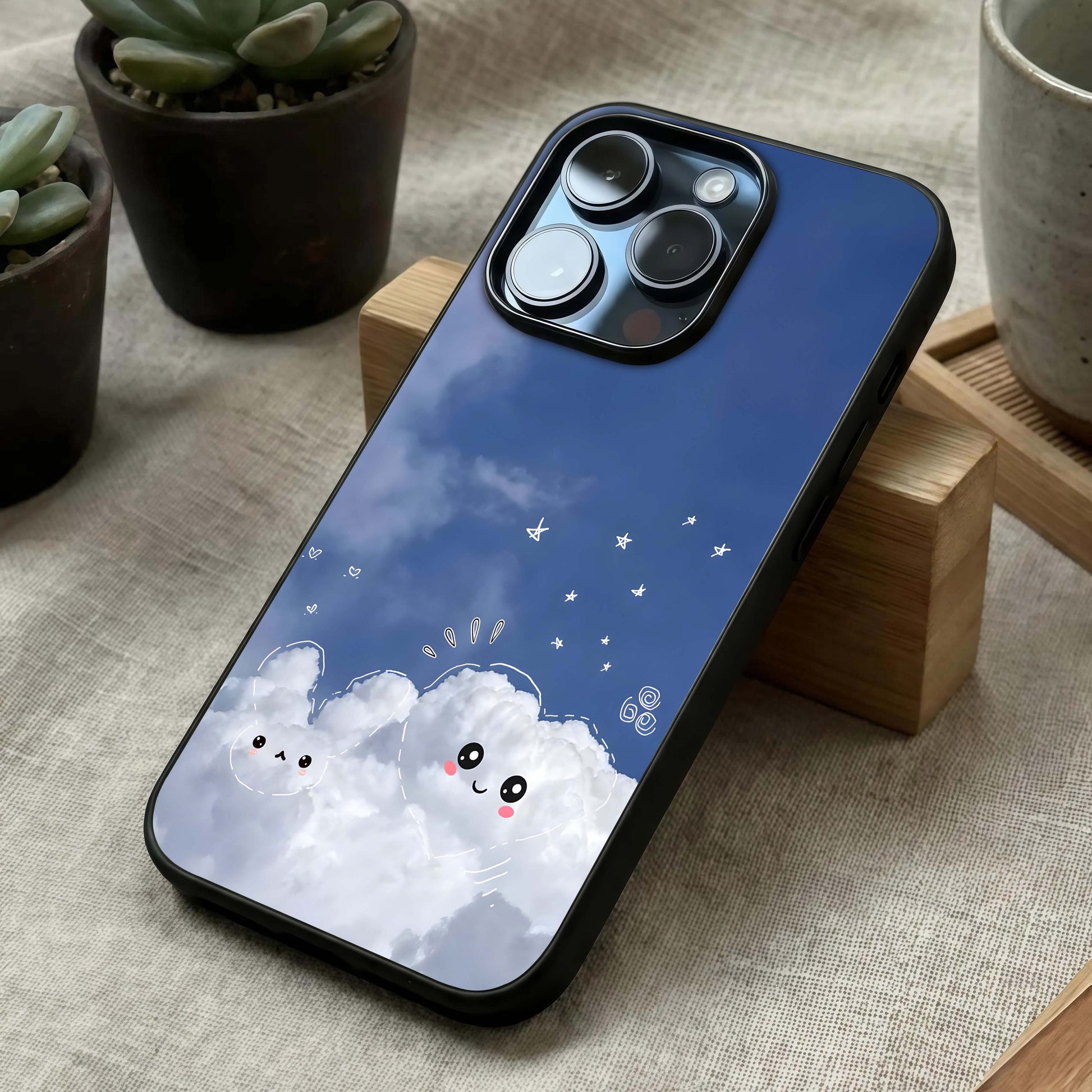 Cute Blossom Cloud Glass Case laid diagonally highlighting playful elements and HD glass shine.