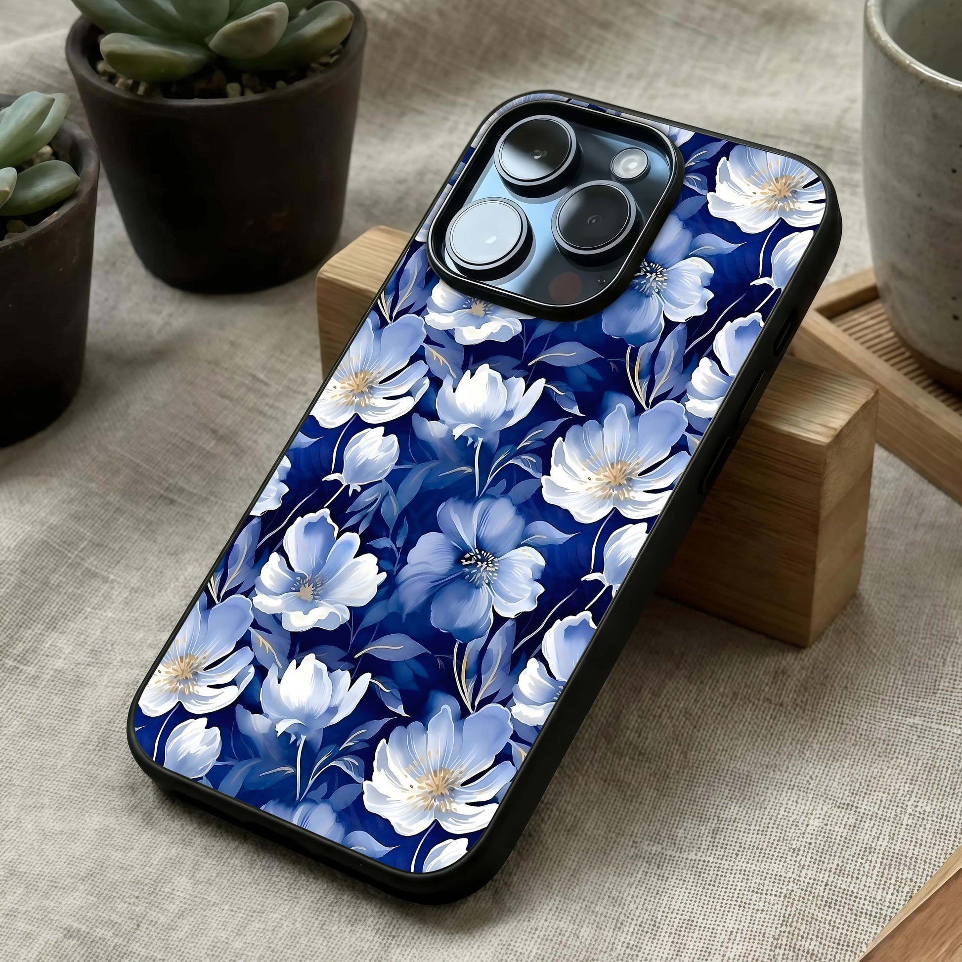 Cute Floral Patterns Glass Case laid diagonally highlighting decorative flow and HD glass shine.