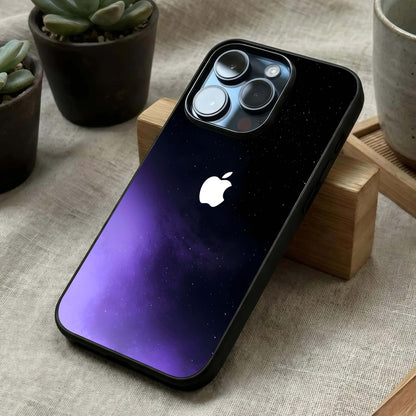 Galaxy Apple Aura Glass Case laid diagonally highlighting luminous accents and HD glass shine.