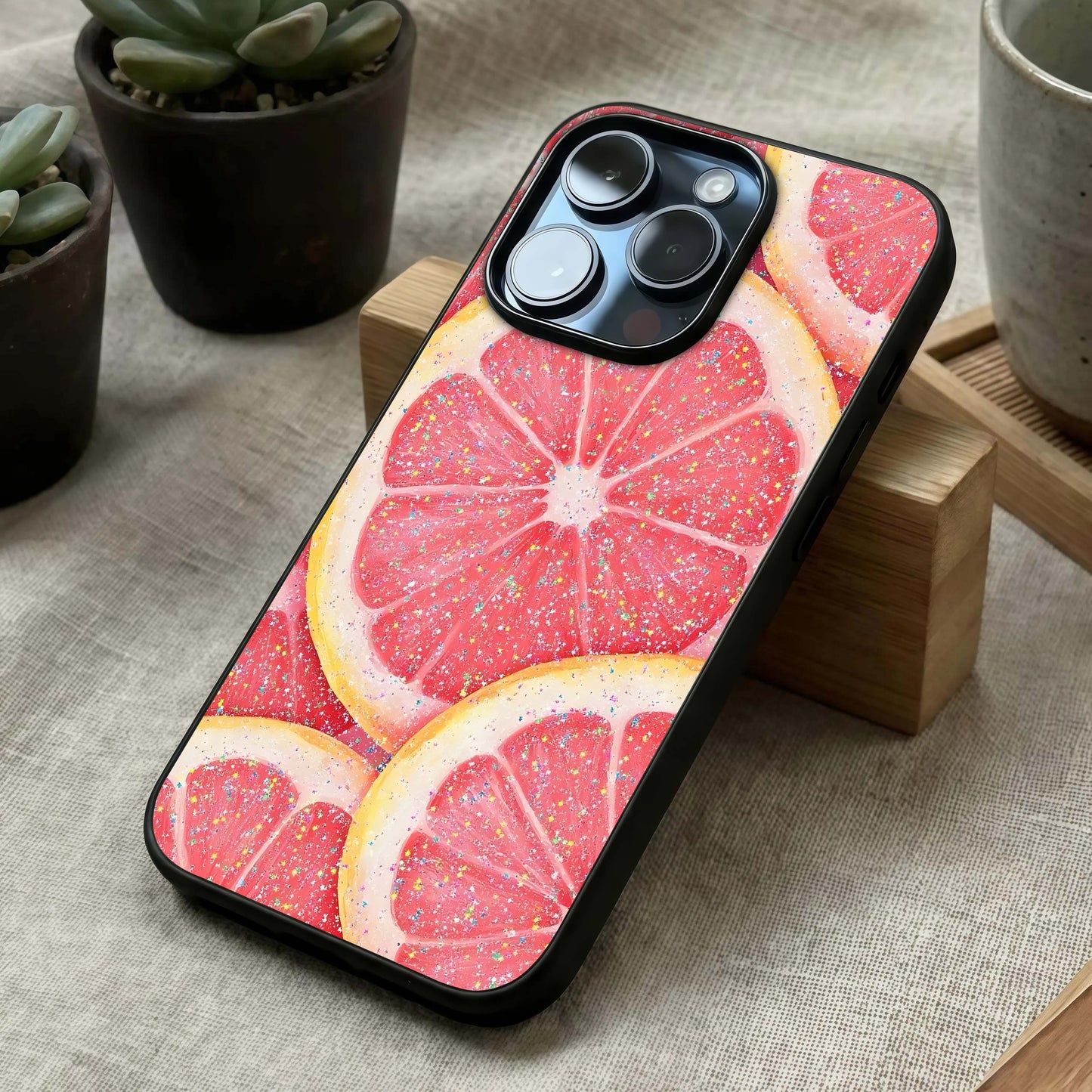 Glitter Grapefruit Glass Case laid diagonally highlighting glitter accents and HD glass shine.