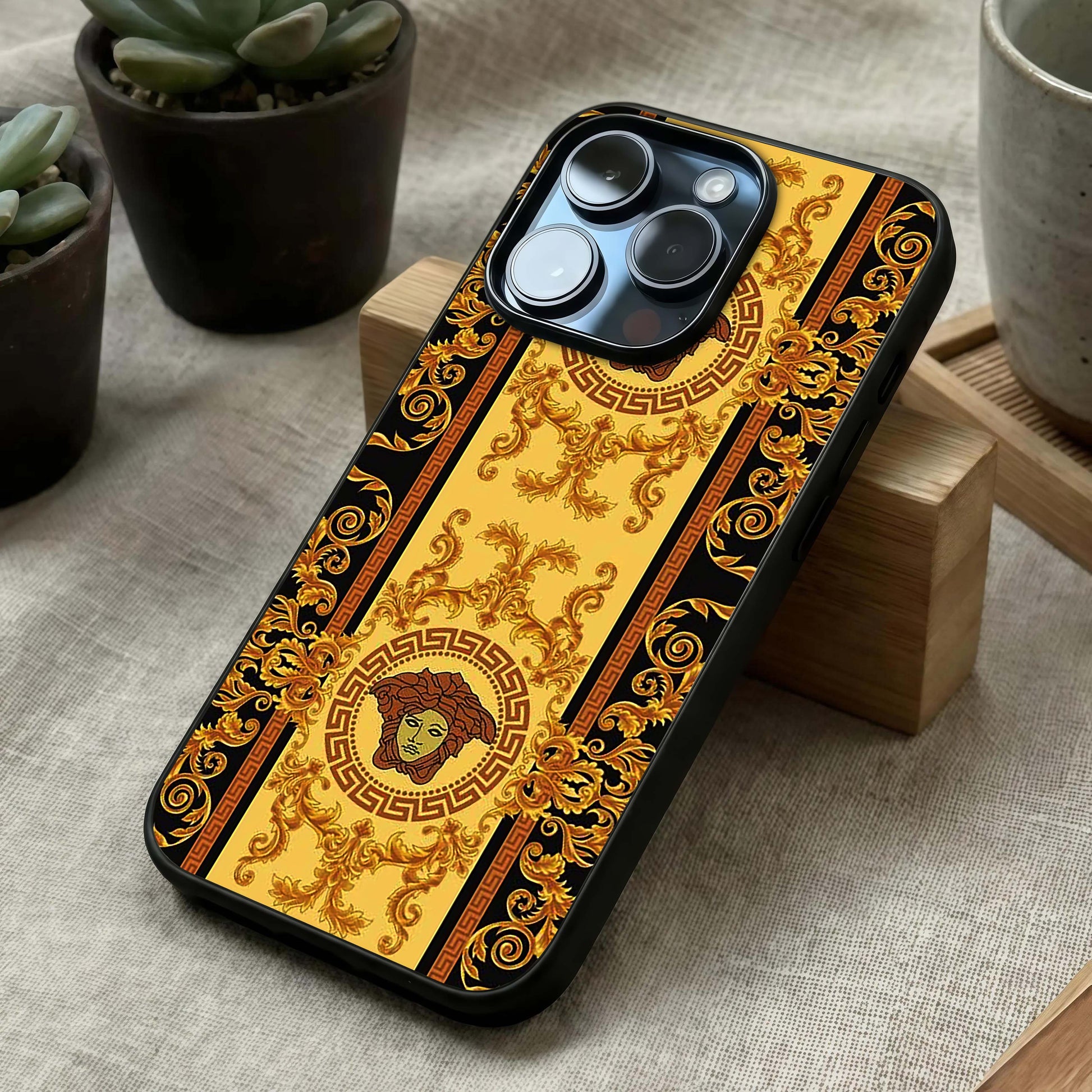 Golden Royal Heritage Glass Case laid diagonally highlighting rich textures and HD glass shine.