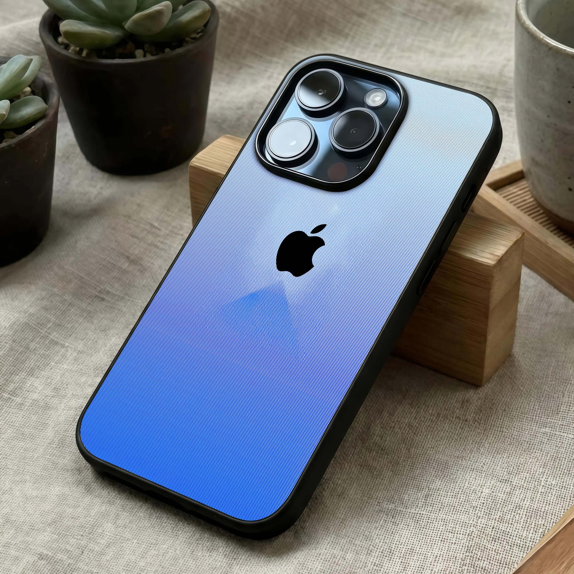 Gradient Apple Vibe Glass Case laid diagonally highlighting seamless transitions and HD glass shine.