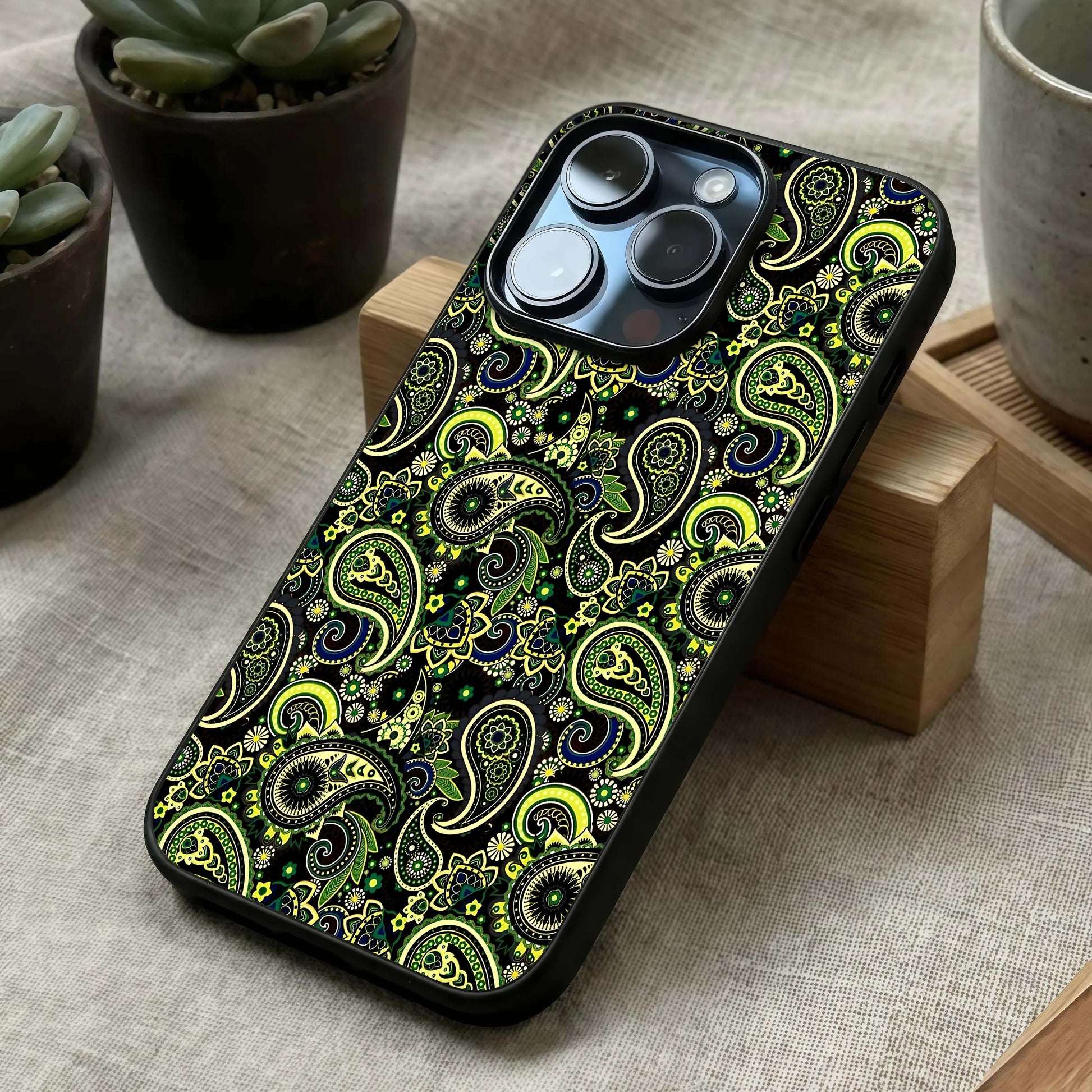 Green Mandala Pattern Glass Case laid diagonally highlighting ornamental flow and HD glass shine.