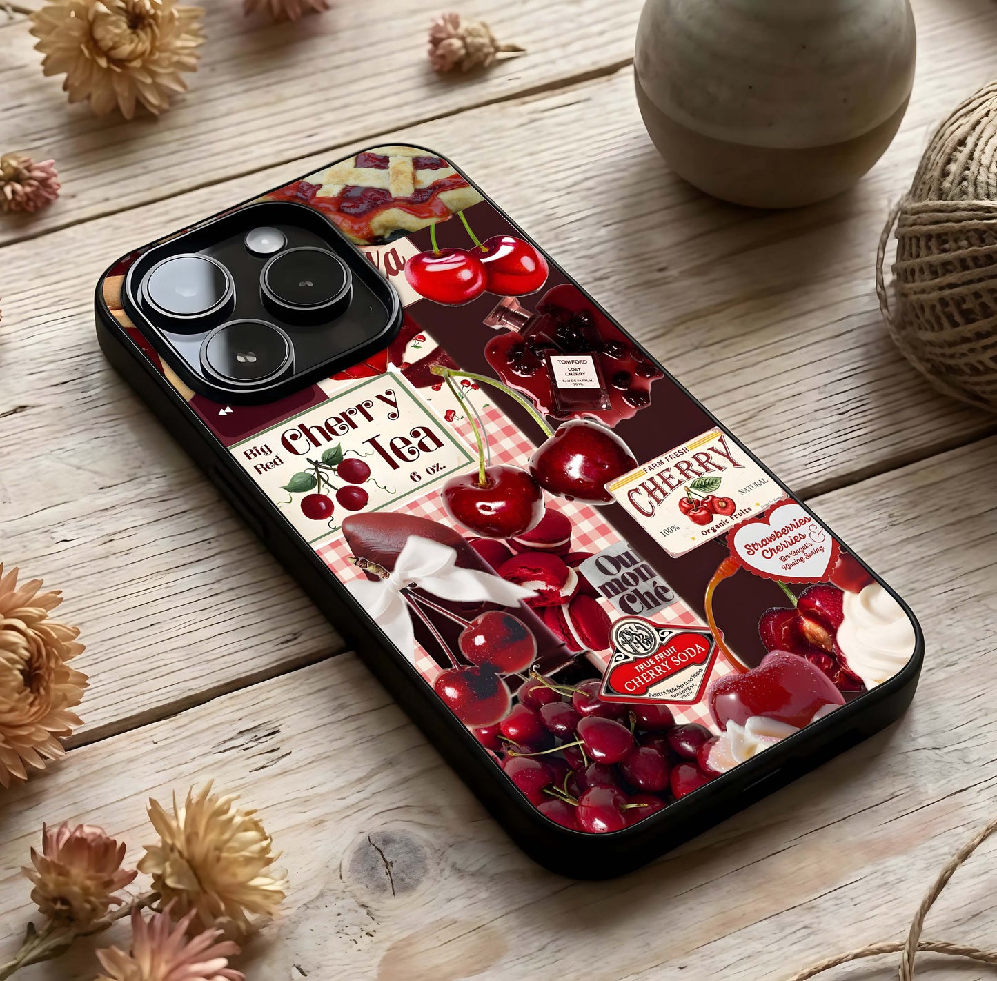 Aesthetic Cherry Tea Glass Case photographed in natural light showing reflective finish and gentle design depth.