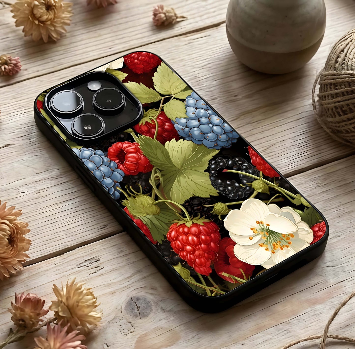 Berry Bloom Charm Glass Case photographed in natural light showing reflective finish and subtle depth.