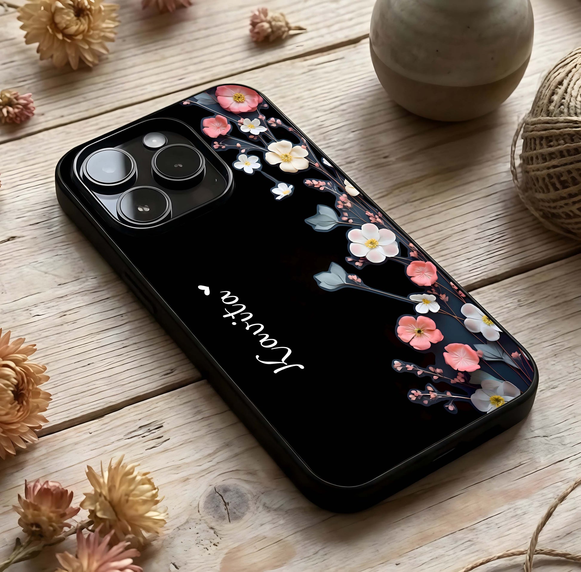 Black Elegance Floral Custom Name Glass Case photographed in natural light showing reflective finish and luxury depth.