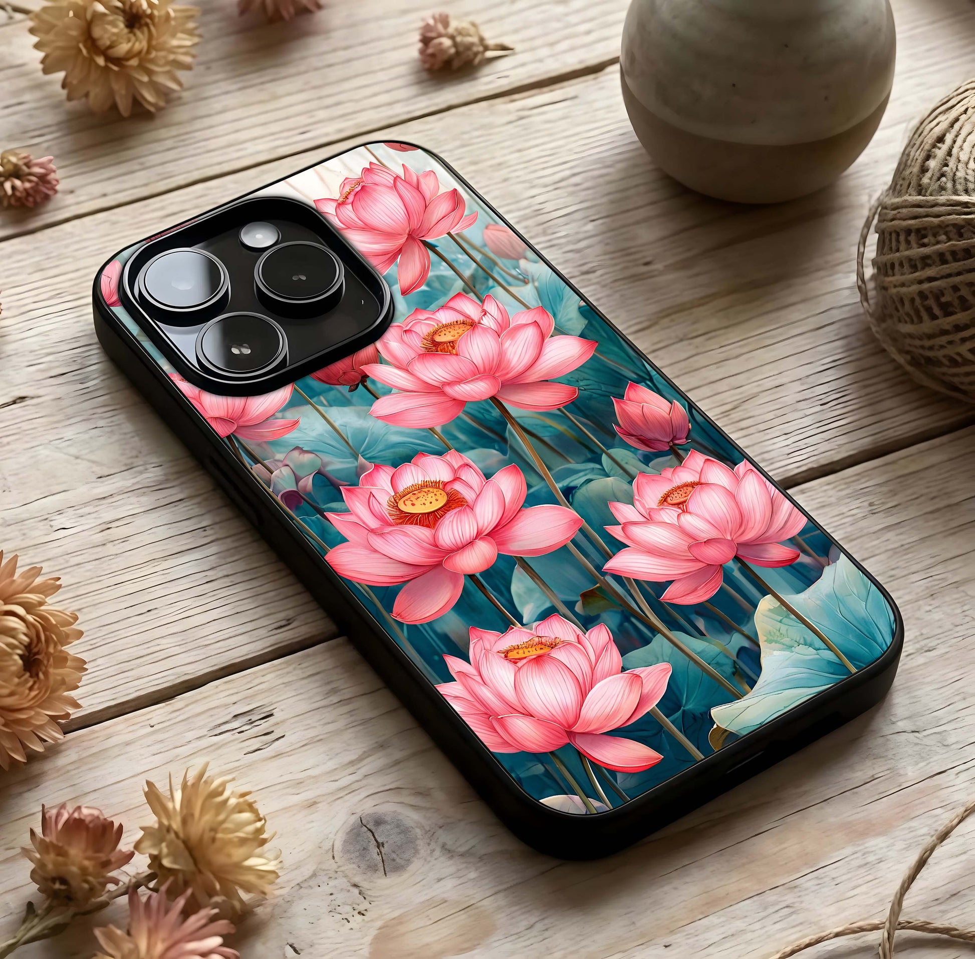 Celestial Pink Lotus Glass Case photographed in natural light showing reflective finish and serene depth.